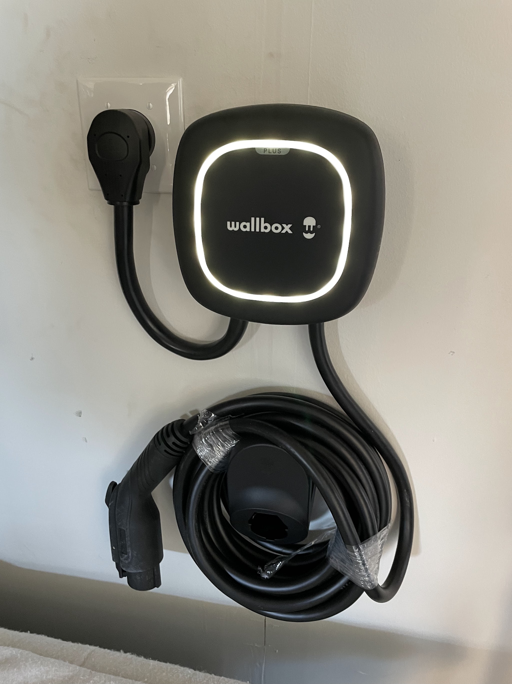Wallbox EV charger installed in a garage by Nelson Electric